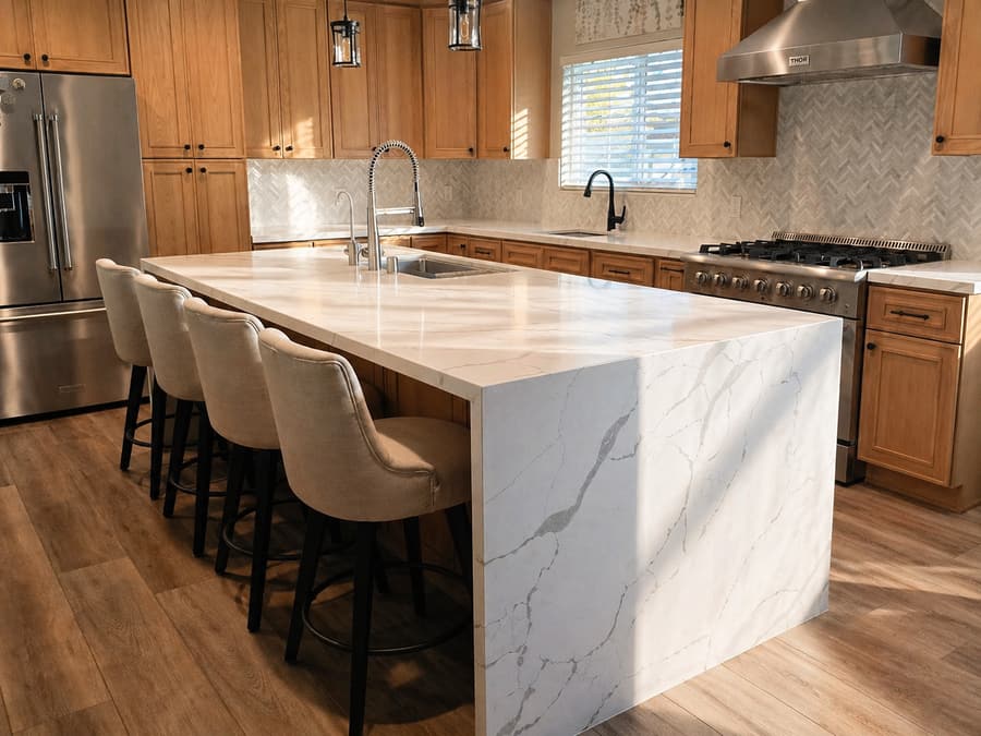 Completed kitchen tile installation with custom finish work